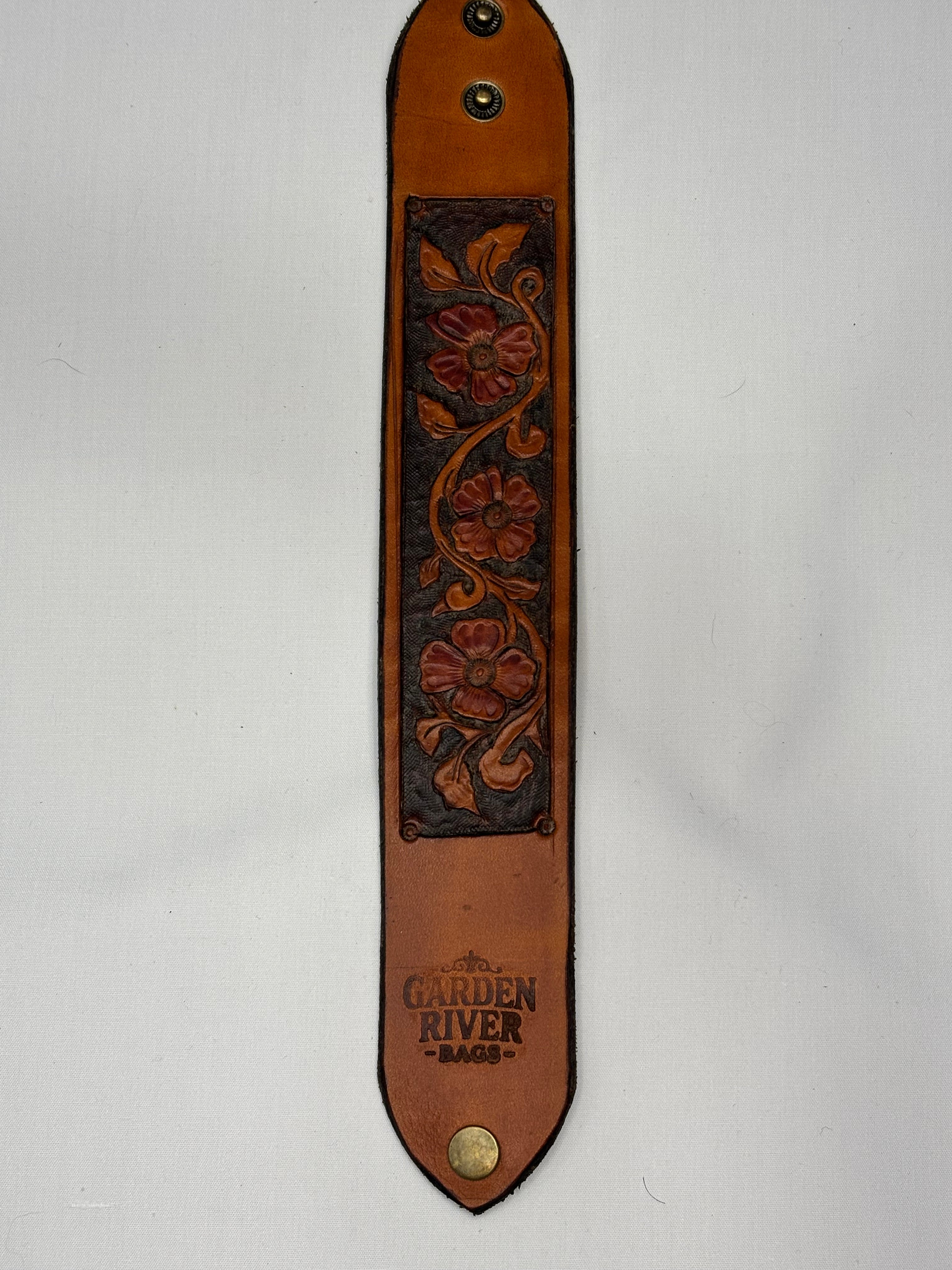 Classic style hand tooled leather wrist strap